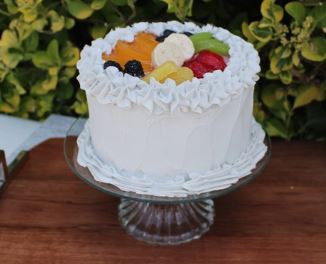 Small Fake Vanilla Cake Topped with Fruit